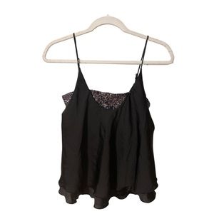 Boutique tank top! Great for fun events or NYE party! XS but fits like a S-M